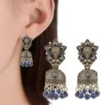 Silver Plated Floral Stud Jhumka Earrings With Black Stones